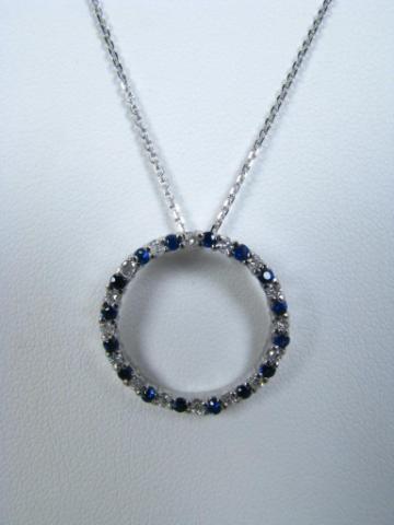 Appraisal: k white gold '' chain with diamond sapphire Circle of