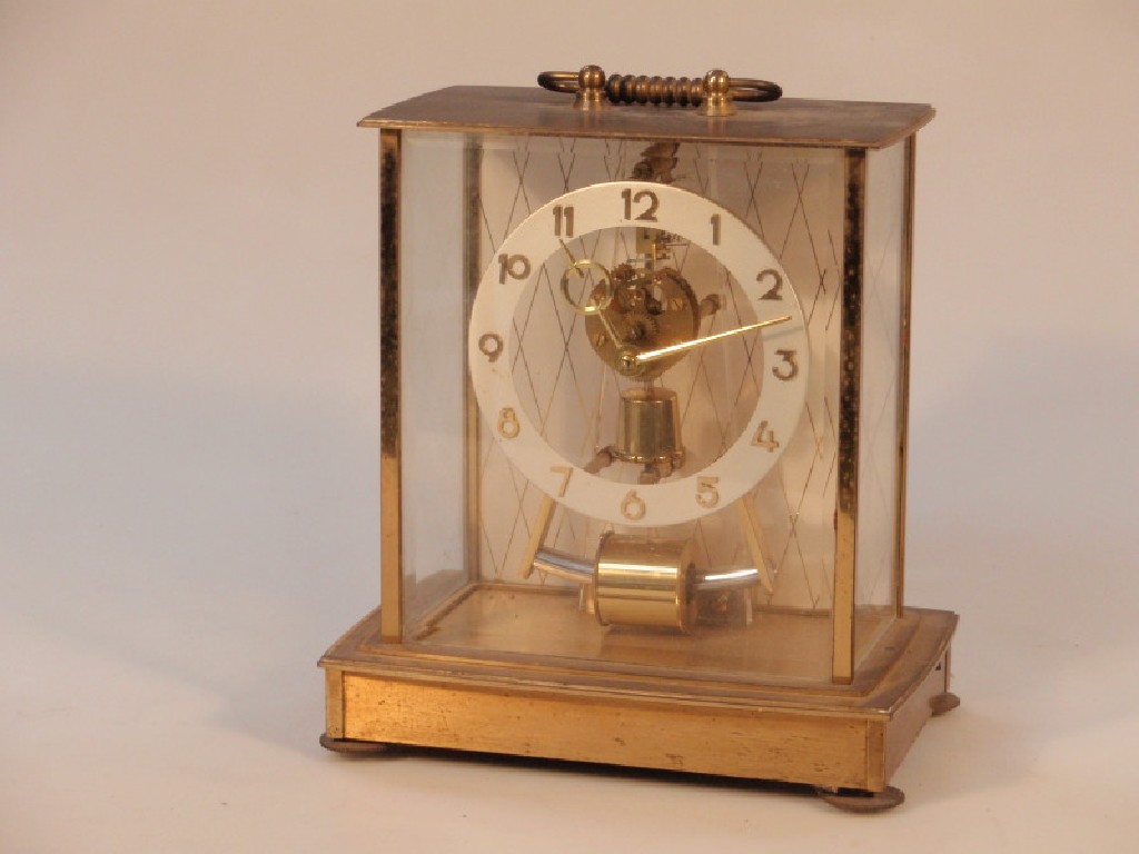 Appraisal: A Keninger and Obergfell mantel clock marked Kundo with electric