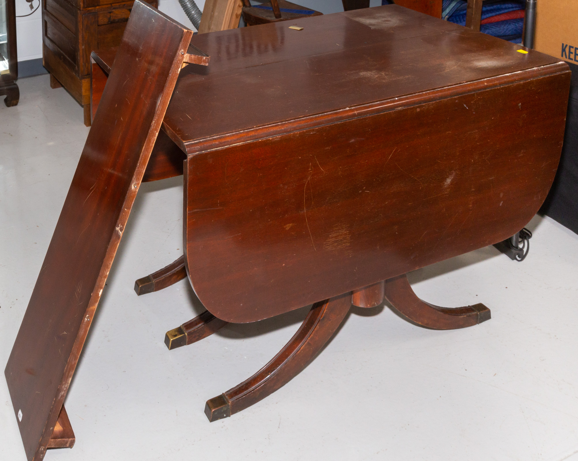 Appraisal: REGENCY STYLE MAHOGANY DINING TABLE rd quarter th century Double