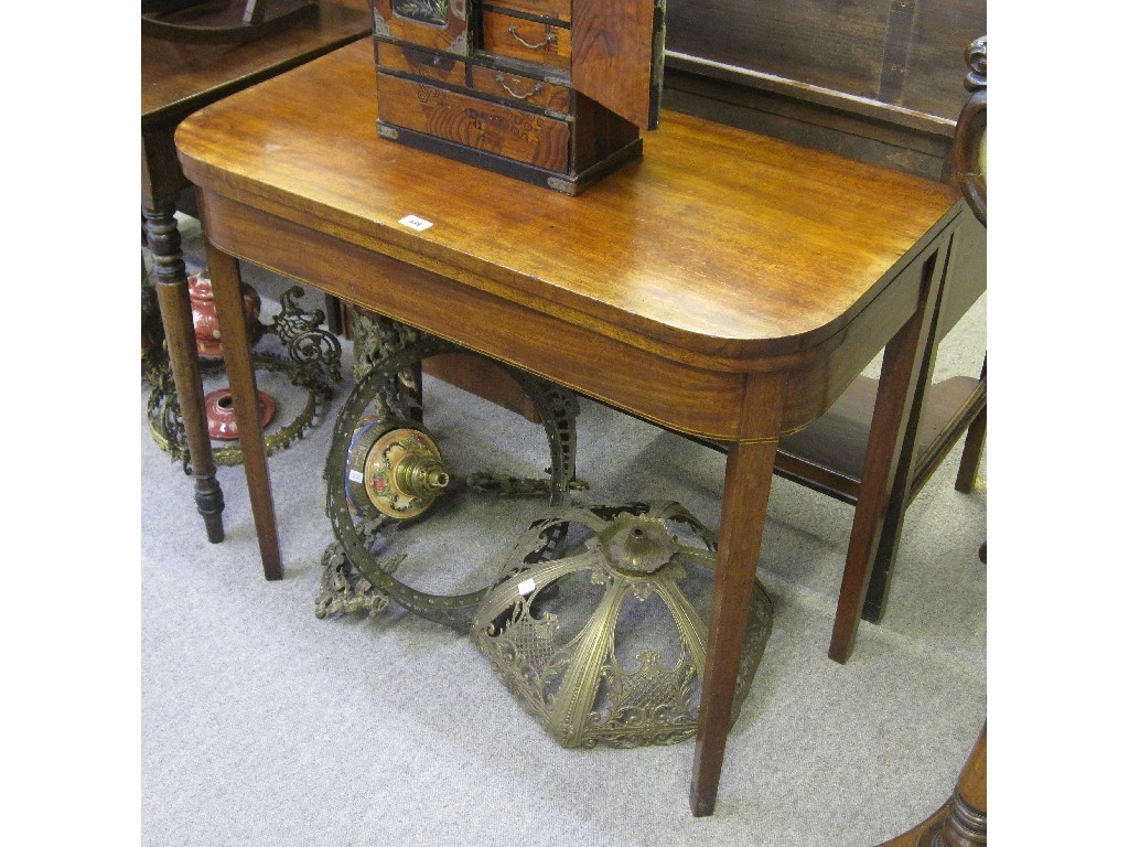 Appraisal: Mahogany turnover tea table