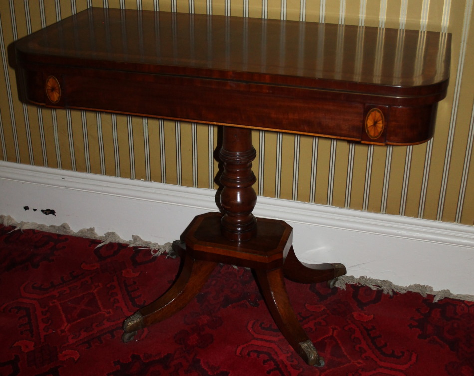 Appraisal: A George IV mahogany and satinwood card table the rectangular