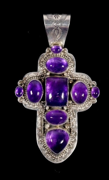 Appraisal: Large sterling silver cross pendant with amethyst cabochon stones oval