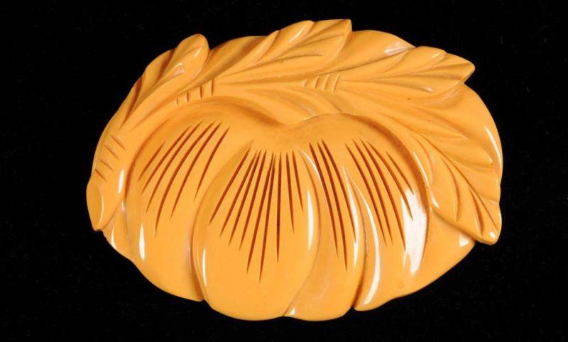 Appraisal: Bakelite Deeply Carved Floral Pin Condition Excellent Size - L