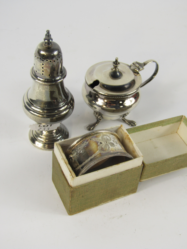 Appraisal: A George V silver pepperette of baluster form Birmingham mustard