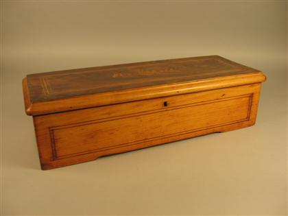 Appraisal: Swiss cylinder music box th century The rectangular oak case