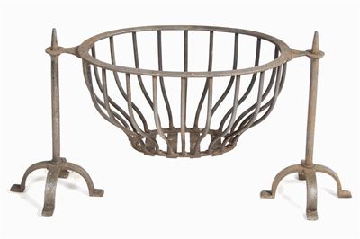 Appraisal: A wrought iron firegrate with an open hanging basket in