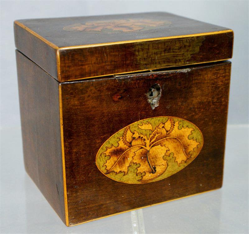 Appraisal: Oak leaf inlaid figured dark fruitwood tea caddy interior with