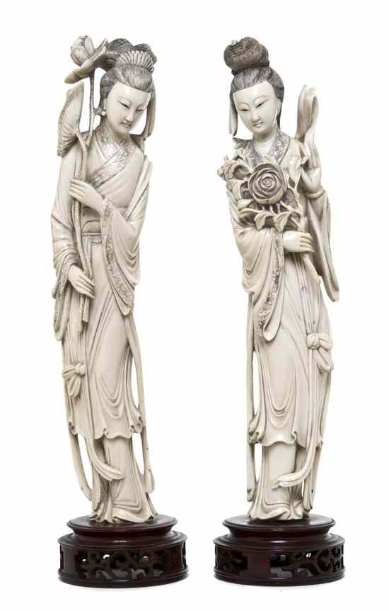 Appraisal: A Pair of Ivory Figures of Ladies the beauties each