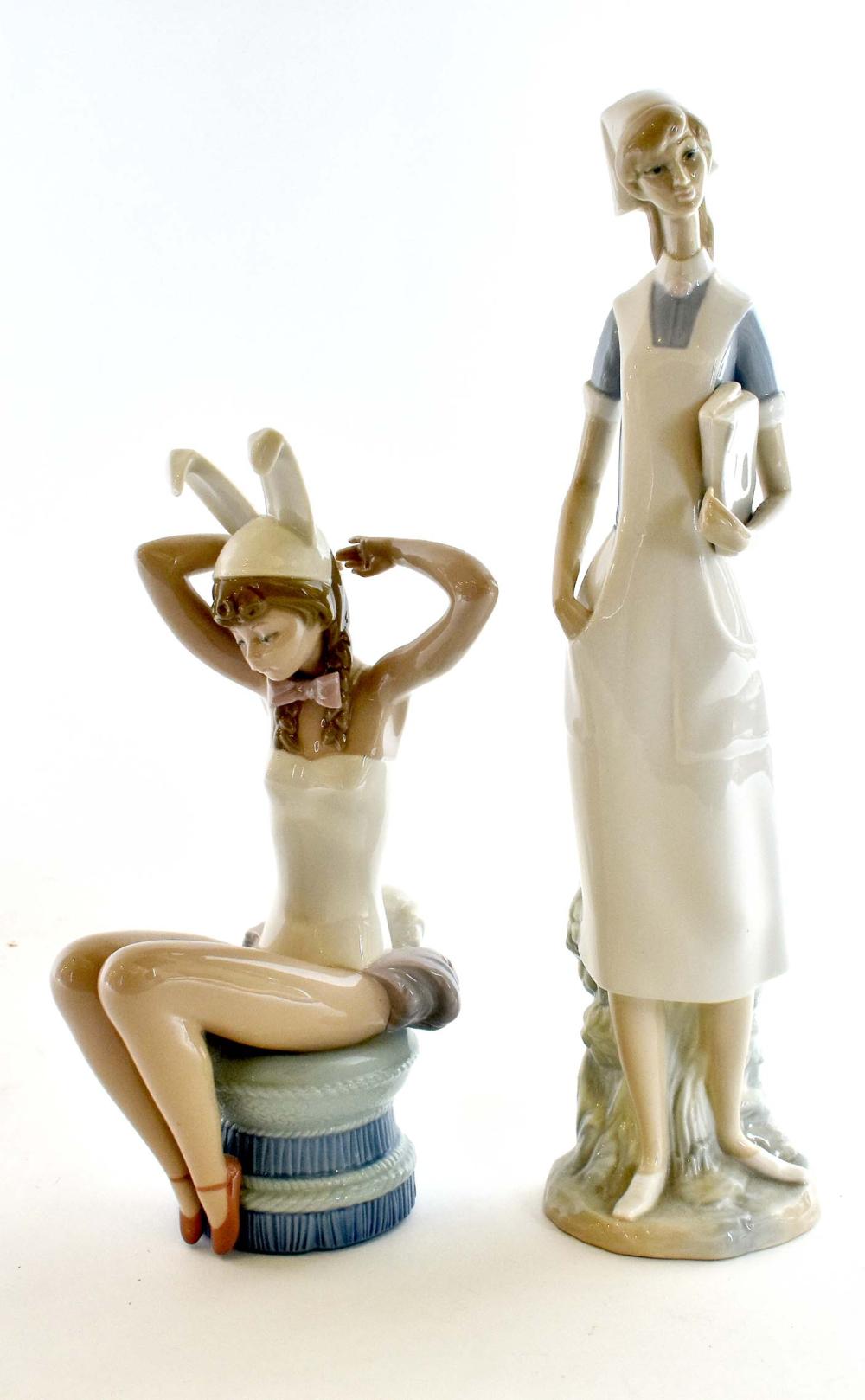 Appraisal: TWO LLADRO PORCELAIN FIGURESEach marked Depicting a Seated Playboy Bunny