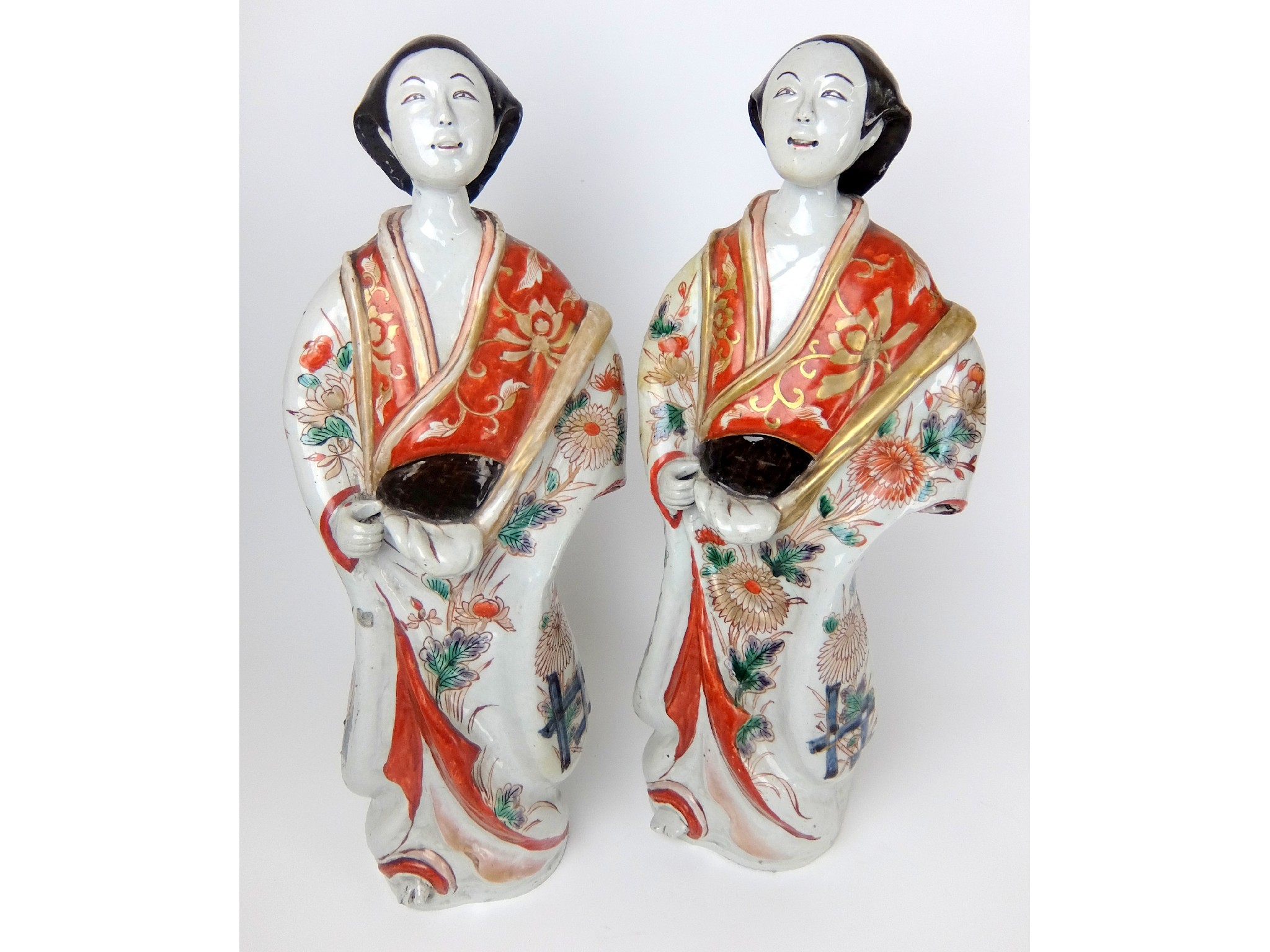 Appraisal: A pair of Arita Bijineach standing and wearing floral patterned