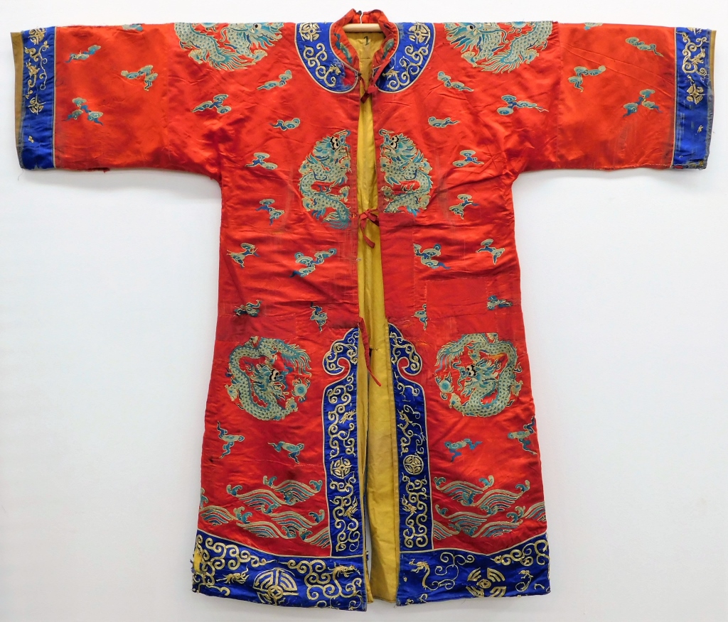 Appraisal: CHINESE SILK RED AND BLUE DRAGON KIMONO China th CenturyVibrant