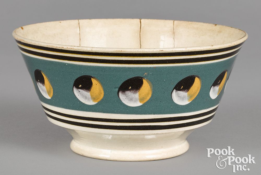 Appraisal: Mocha bowl with cat's-eye decoration Mocha bowl with cat's-eye decoration