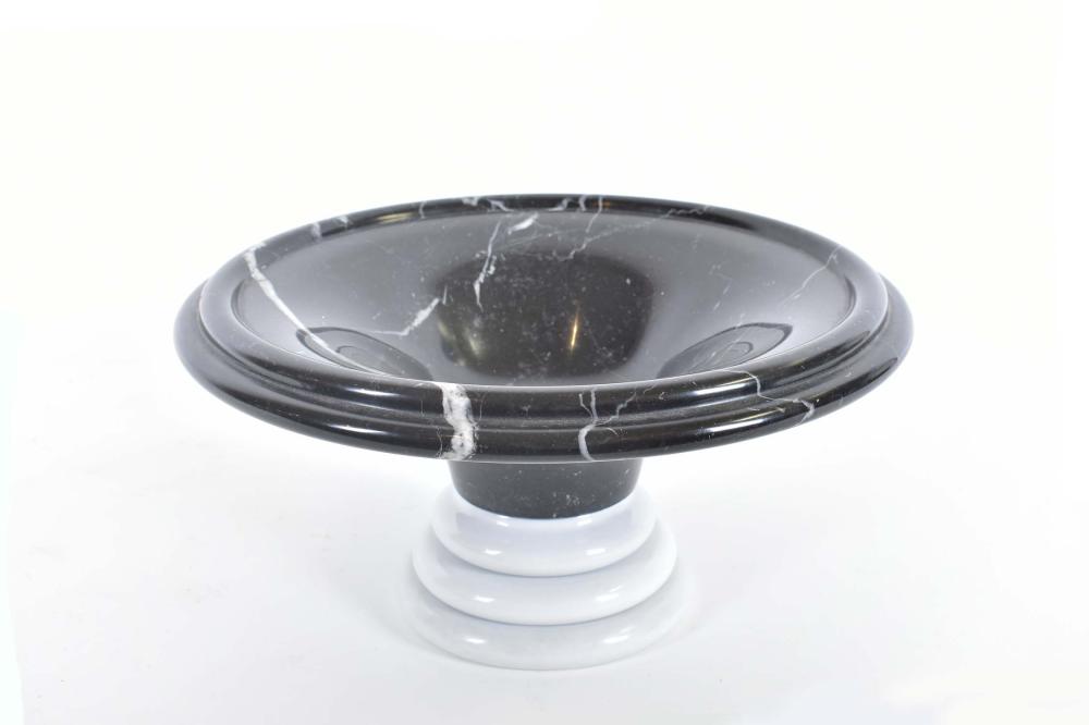 Appraisal: CONTEMPORARY BLACK AND WHITE MARBLE TAZZAThe black bowl with white