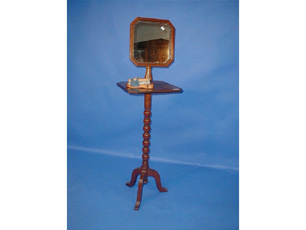 Appraisal: A late Victorian walnut shavers stand with mirror