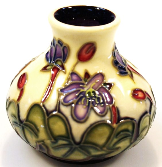 Appraisal: A Moorcroft pottery Hepatica pattern vase by Emma Bossons of