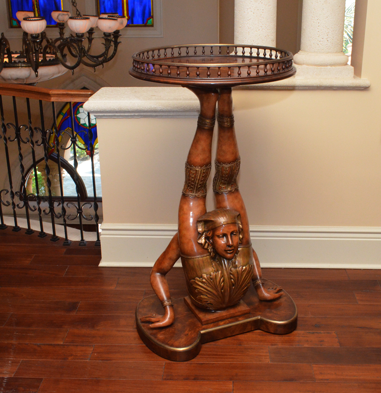 Appraisal: DECO STYLE CARVED FIGURAL CONTORTIONIST TABLE Contemporary side table or