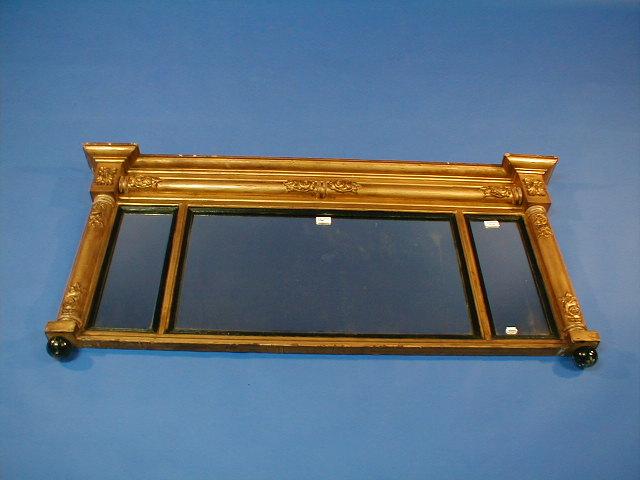 Appraisal: A Regency gilt wood over mantel mirror with applied tulip