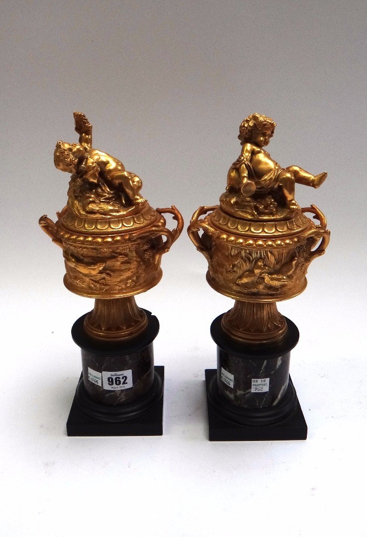 Appraisal: A pair of omolu and marble garnitures late th century