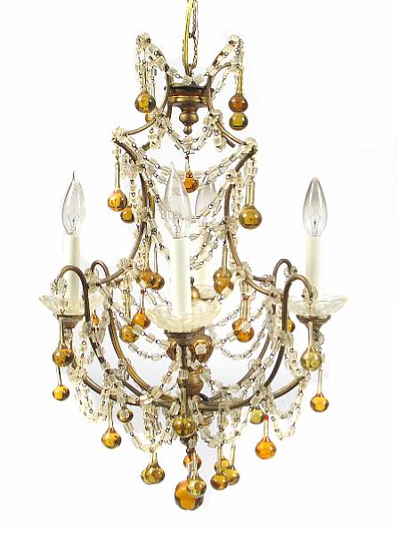 Appraisal: An Italian crystal and giltwood four light chandelier height in