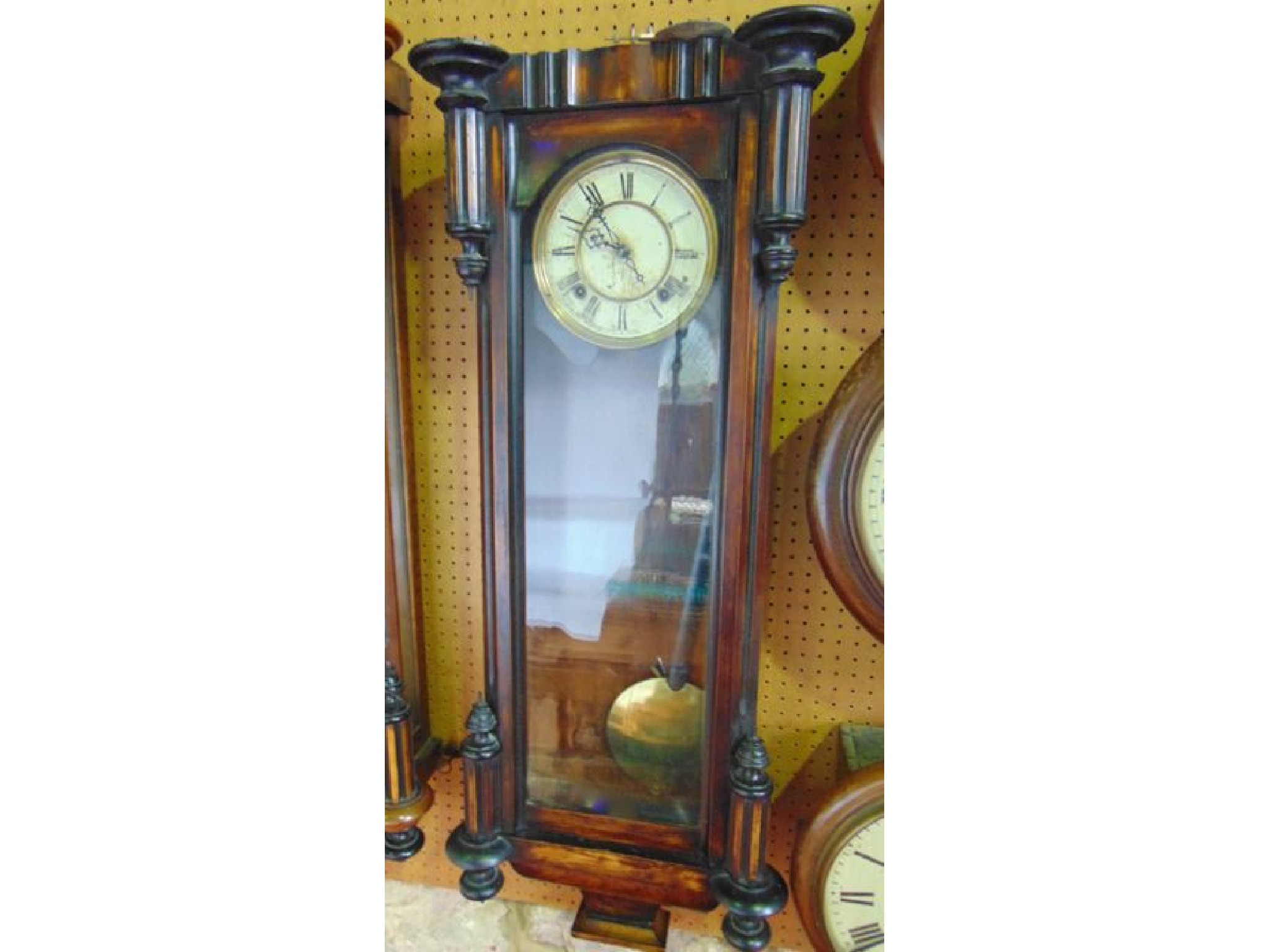 Appraisal: A late th century Vienna regulator wall clock the walnut