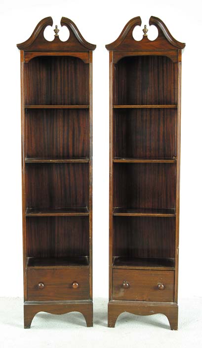 Appraisal: PAIR OF TALL MAHOGANY BOOKCASES Three shelves with drawer on