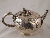 Appraisal: An early George III silver teapot in the naturalistic manner