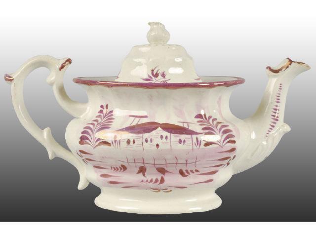 Appraisal: English Staffordshire Pink Luster Teapot Description Original lid Few minor