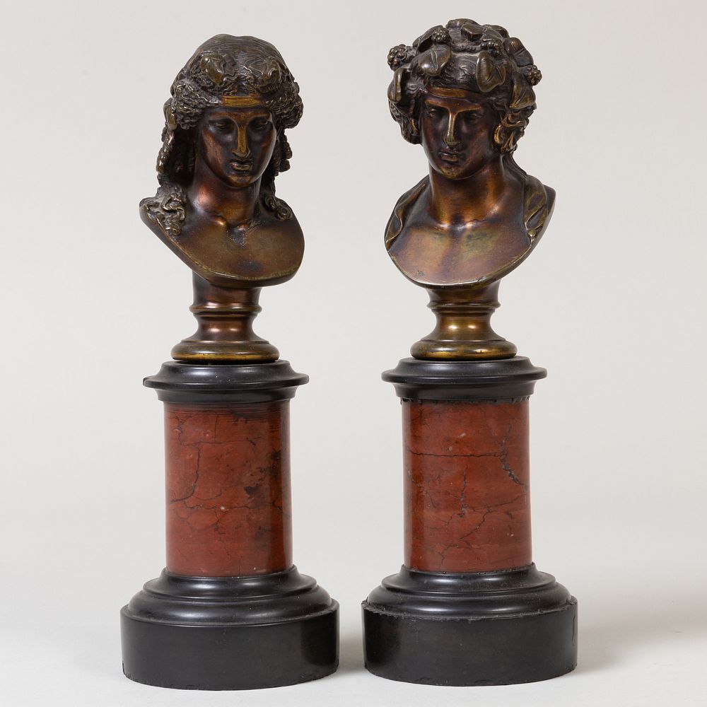 Appraisal: Pair of French Bronze Busts of Apollo and Eros On