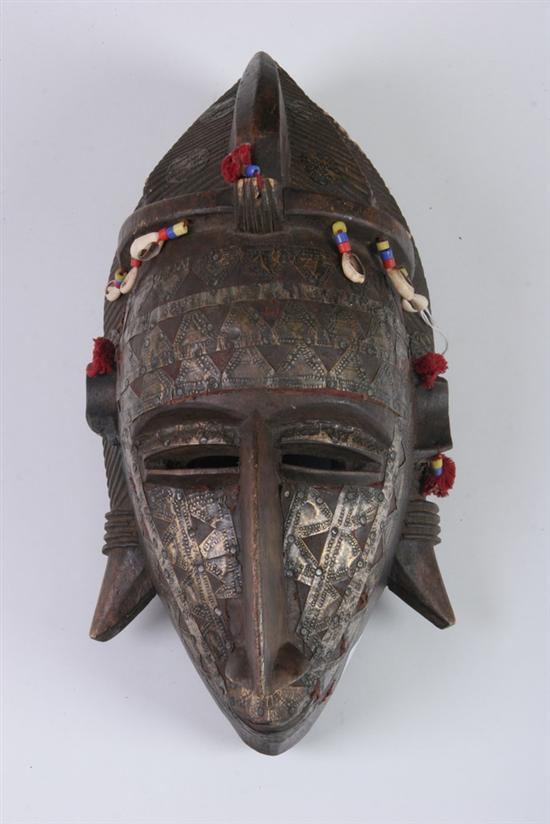 Appraisal: IVORY COAST MASK WITH METAL ORNAMENTATION