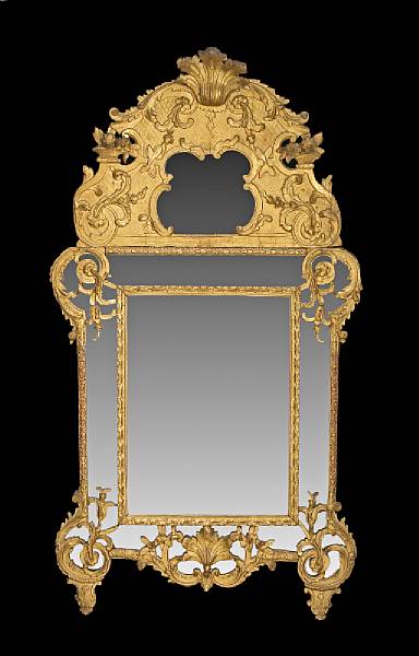 Appraisal: A fine R gence giltwood mirror early th century The