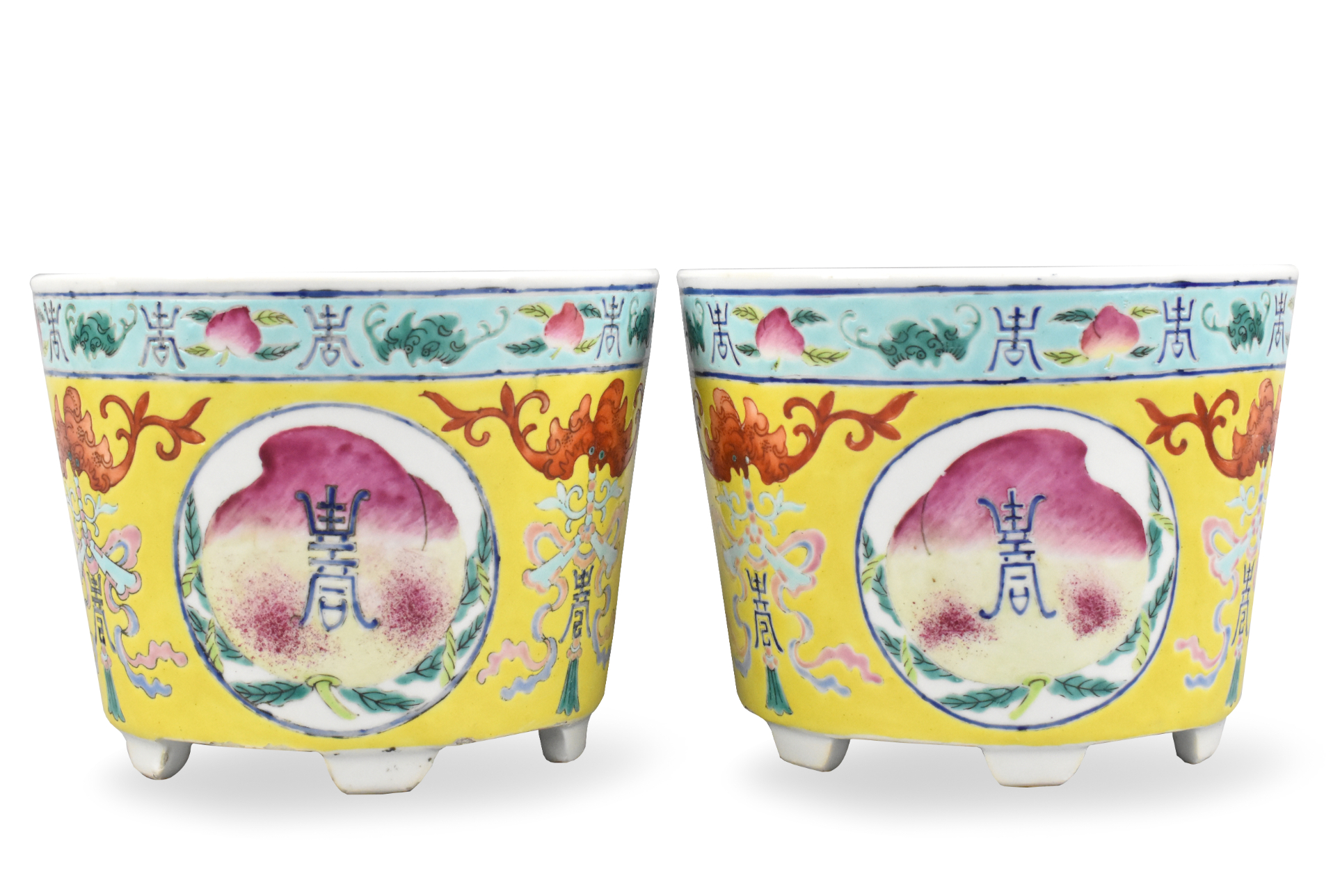 Appraisal: A pair of Chinese yellow peach jardinieres dating from the