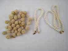 Appraisal: A cultured pearl necklace approx cm long with yellow metal