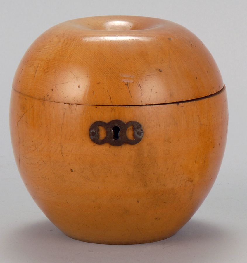 Appraisal: APPLE-FORM WOODEN TEA CADDY th CenturyIn fruitwood Height