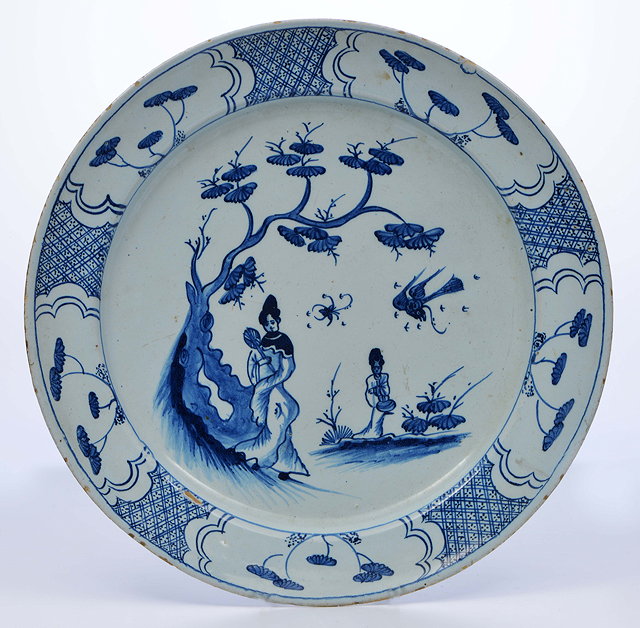 Appraisal: AN TH CENTURY ENGLISH DELFT TIN GLAZED CHARGER decorated with