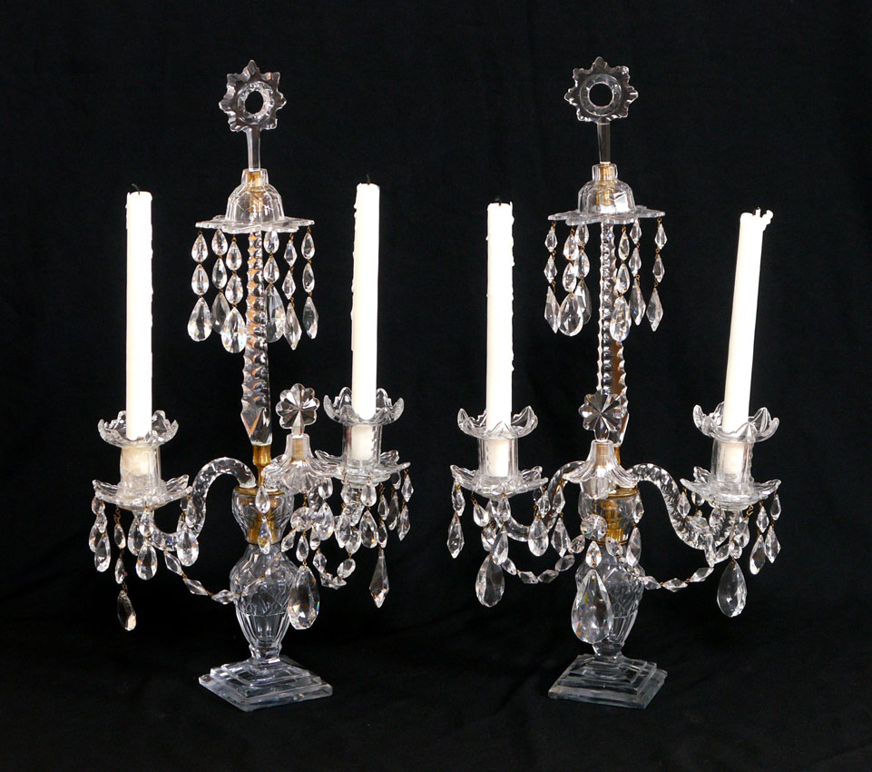 Appraisal: PAIR GEORGIAN CRYSTAL CANDELABRA Each with star finial over prism