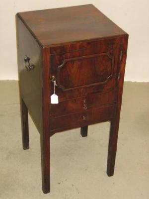 Appraisal: A MAHOGANY BEDSIDE CUPBOARD of square form with brass side