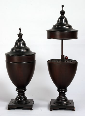 Appraisal: Urn form with urn finials square base ogee bracket feet