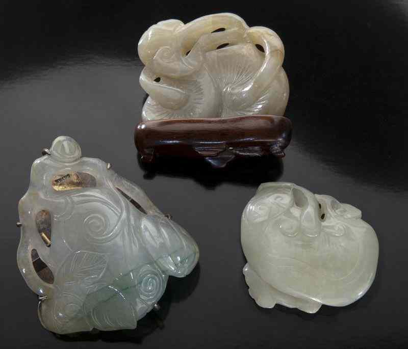 Appraisal: Pcs Chinese Qing carved jade togglesdepicting lingzhi and pumpkins Largest