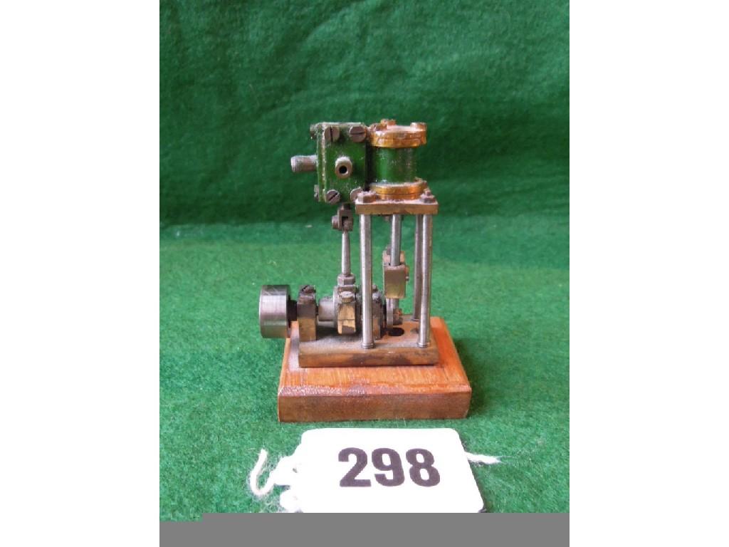 Appraisal: A miniature model vertical single cylinder engine inches high approx