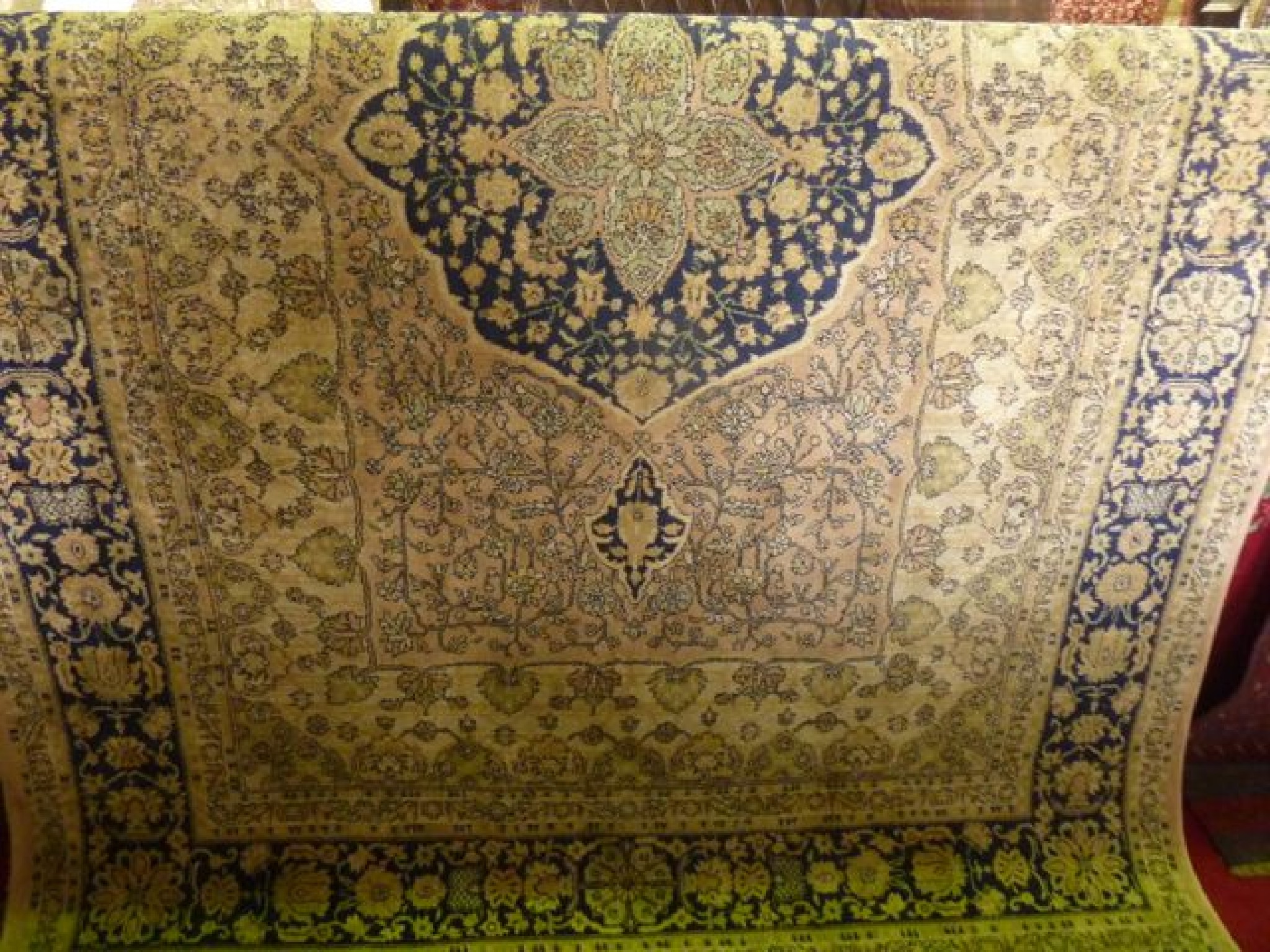 Appraisal: A cotton rug in the Persian style the central medallion