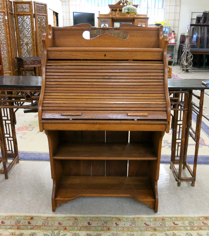 Appraisal: SMALL OAK ROLL-TOP WRITING DESK American c having a sliding