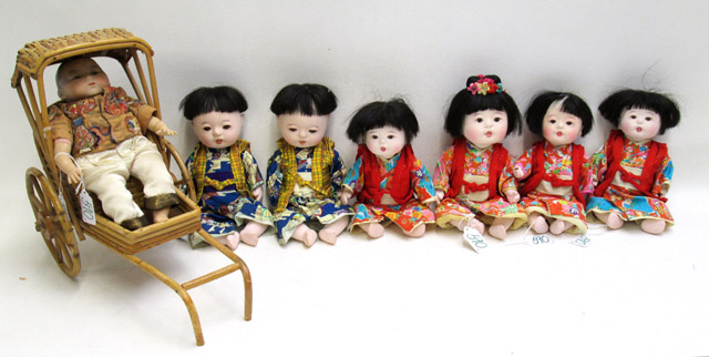 Appraisal: COLLECTION OF EIGHT ASIAN DOLLS PLUS ACCESSORIES bisque head boy