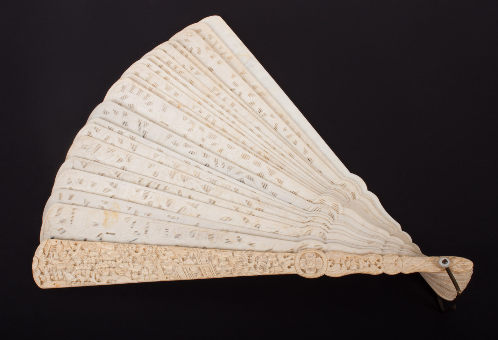 Appraisal: Chinese carved ivory fan late th century each end piece