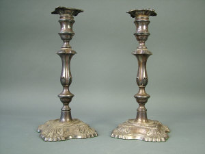 Appraisal: A pair of silver Edward VII candlesticks London NOTE MAKER