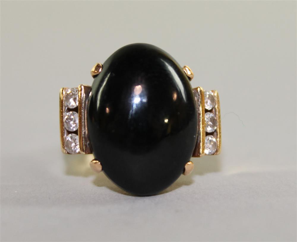 Appraisal: LADY'S K YELLOW GOLD BLACK STONE AND DIAMOND COCKTAIL RING