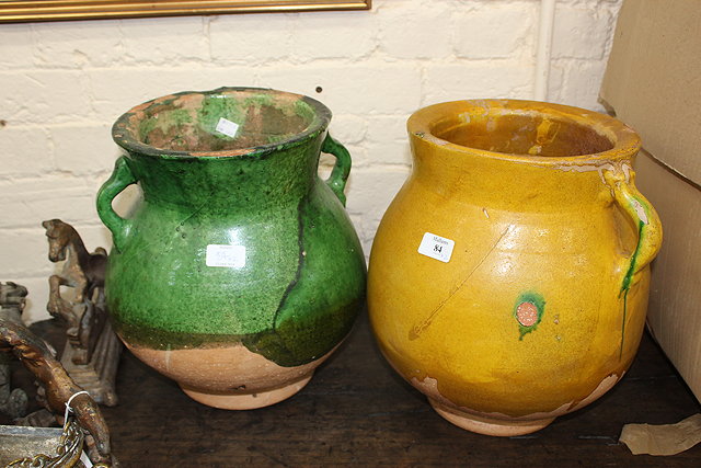 Appraisal: A CONTINENTAL TERRACOTTA GREEN GLAZED VASE of ovoid form with