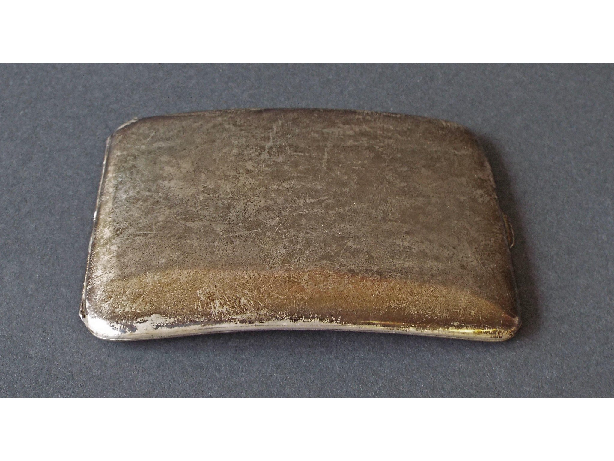 Appraisal: Edwardian silver hip shaped cigarette case with gilt interior with