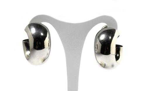 Appraisal: PLATINUM CLIP EARRINGS MAX POLLINGER Platinum g Casual half-solid broad