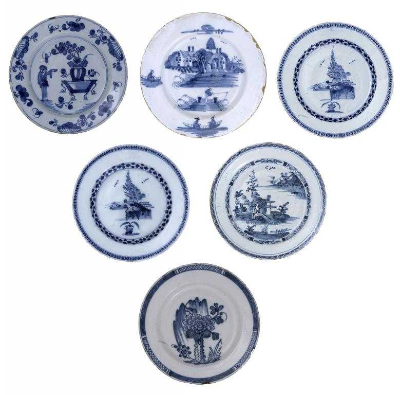 Appraisal: THREE AND A PAIR OF DUTCH DELFTWARE PLATES painted in