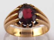 Appraisal: A carat gold garnet ring hallmarked Chester garnet approx x